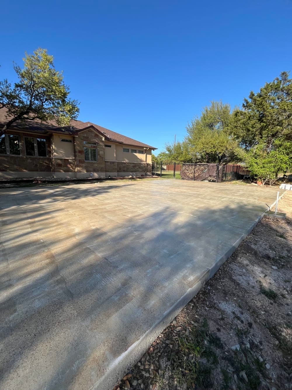 Slab after crack prep and primer coat, ready for the base coat, in Georgetown, Texas